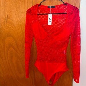 Size small red mesh bodysuit. Brand new with tags!